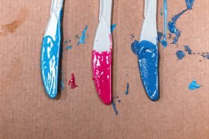 Photo of Acrylic Paints applied on Three Steel Knives