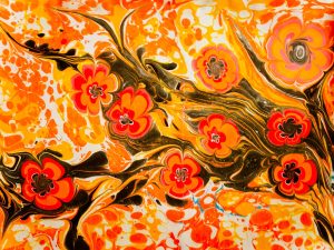 orange and yellow floral textile